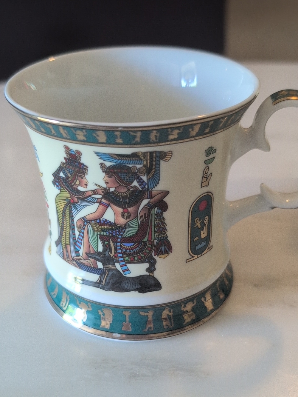 Limoges Egyptian Motif Teacup in White and Teal with Gold Trim